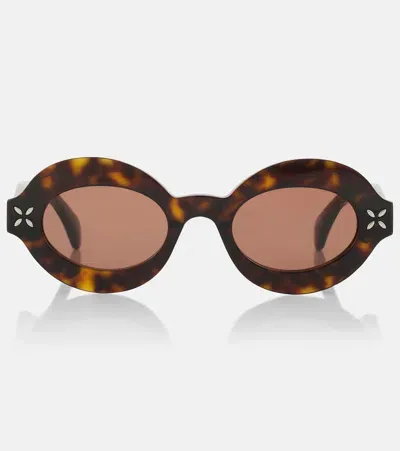 Alaïa Petal Round Sunglasses In Brown