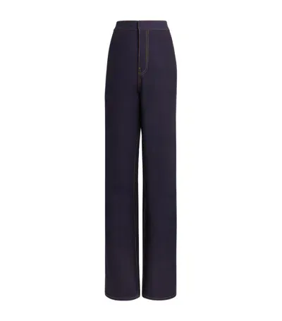 Alaïa Fluid Wool-silk Straight-leg Pants In Dark Wash