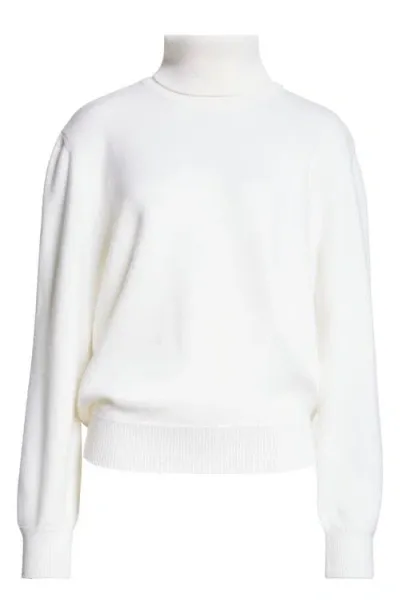 Alaïa Wool Turtleneck Sweater In Blanc Naturel