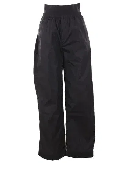 Alainpaul Trousers In Black