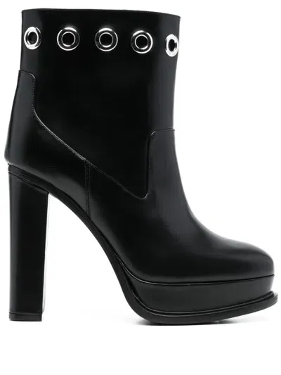 Alexander Mcqueen Heeled Eyelet Leather Boots In Negro