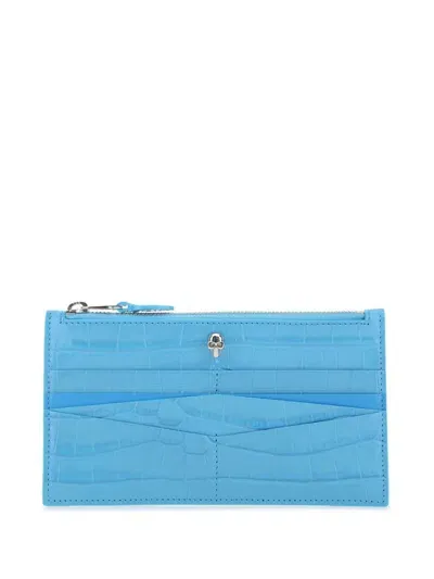 Alexander Mcqueen Embossed Zipped Wallet In Blue