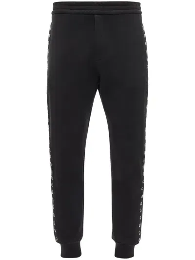 Alexander Mcqueen Eyelet-detail Track Pants In Black