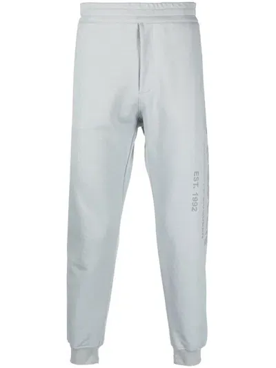 Alexander Mcqueen Logo-print Cotton Track Pants In Grau