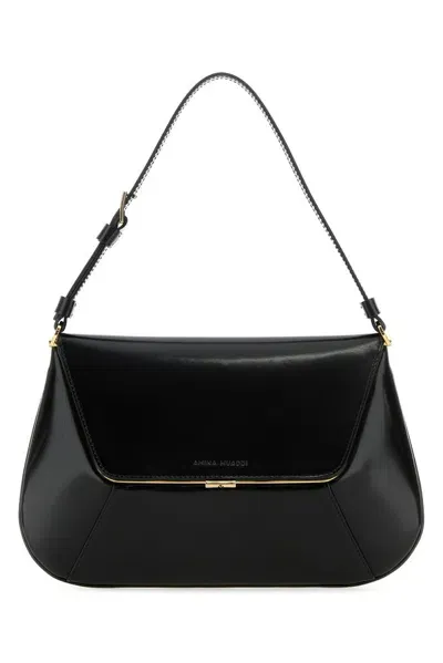 Amina Muaddi Handbags. In Black