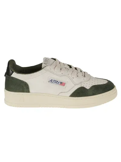 Autry Low Man Sneakers In Goat Suede Mil Black