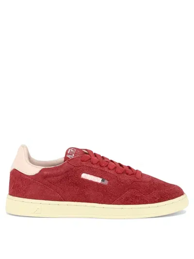 Autry Suede Texture Low Top Sneakers In Red