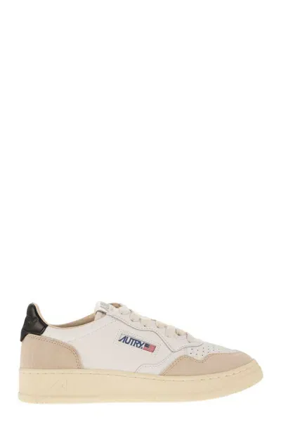 Autry Medalist Sneakers In White/black Leather In Gold