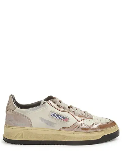 Autry Sneakers In Luxurious Cow Leather With Trendy Metallic Accents In Pink