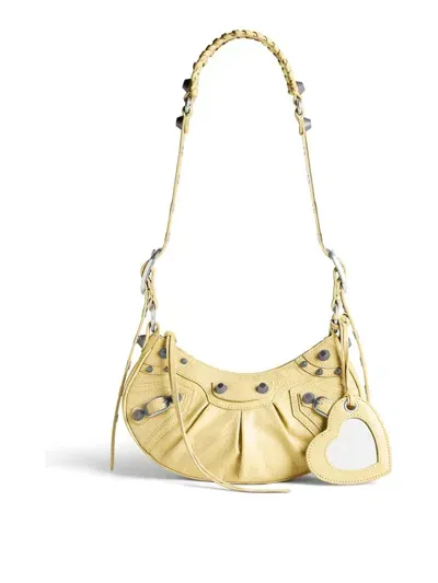 Balenciaga Le Cagole Xs Leather Shoulder Bag In Yellow