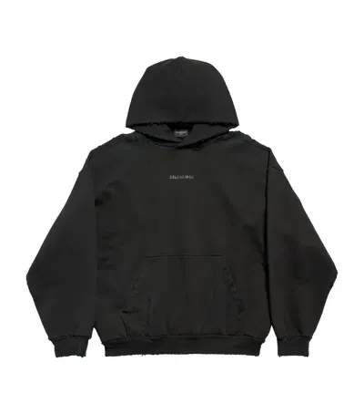 Balenciaga Cotton Distressed Logo Hoodie In Black