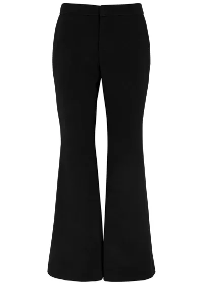 Balmain Flared Crepe Trousers In Black