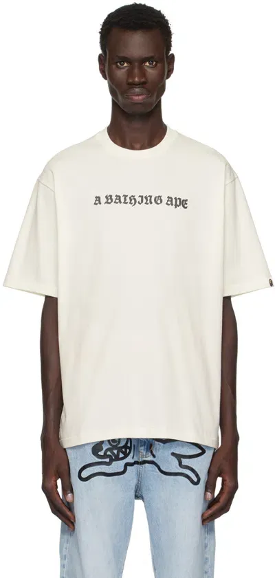 Bape Off-white Gothic Logo Relaxed Fit T-shirt In Ivory