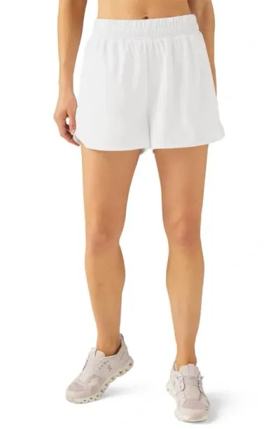 Beyond Yoga In Stride Lined Running Shorts In White