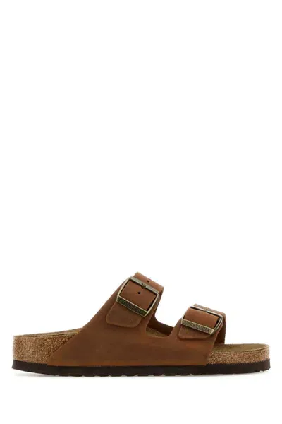 Birkenstock Arizona Waxy Leather Sandals In Brown