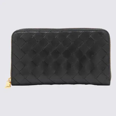 Bottega Veneta Black Gold Leather Intrecciato Wallet In Black-gold