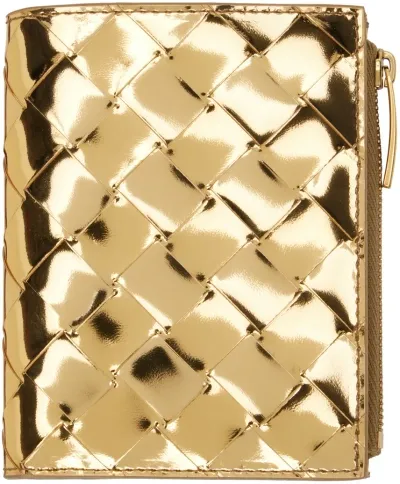 Bottega Veneta Gold Small Intrecciato Bi-fold Zip Wallet In 8922 Gold M Brass