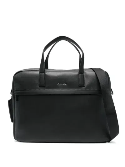 Calvin Klein Logo-lettering Pebbled Laptop Bag In Black