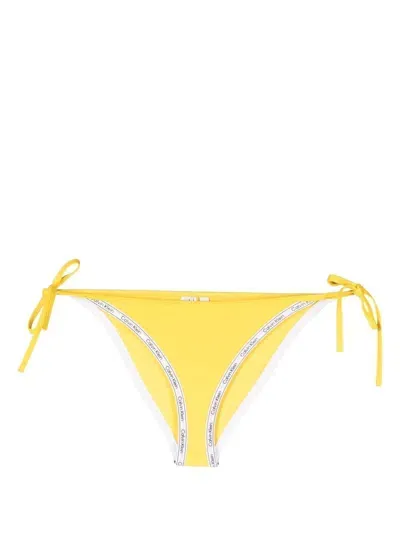 Calvin Klein Logo-print Strap Bikini Bottoms In Yellow