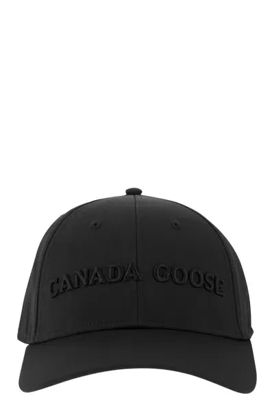 Canada Goose Hat With Visor And Embroidered Logo In Black