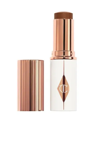 Charlotte Tilbury Unreal Skin Sheer Glow Tint Hydrating Foundation Stick In 15 Deep