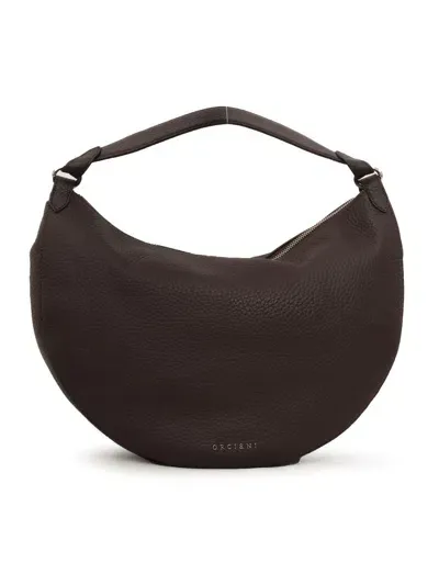 Claudio Orciani Hand Held Bag. In Brown