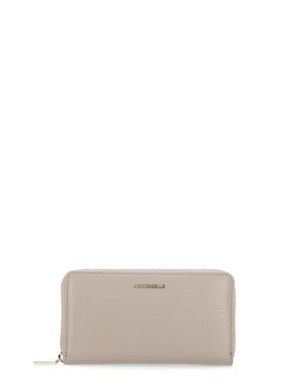 Coccinelle Metallic Logo Stamp Wallet In Beige