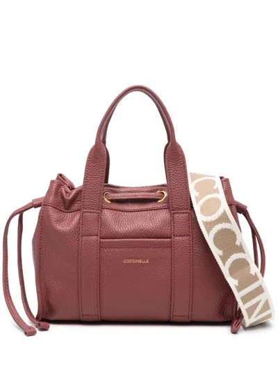 Coccinelle Small 2day Letaher Tote Bag In Brown