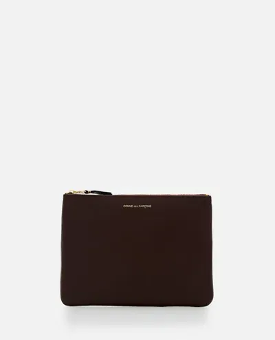 Comme Des Garçons Play Classic Leather Line Pouch In Brown