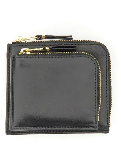 Comme Des Garçons Zipped Wallet In Black