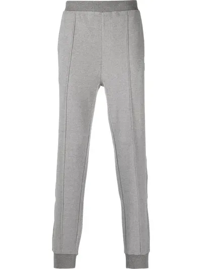 Corneliani Tapered Logo-patch Joggers In Grau