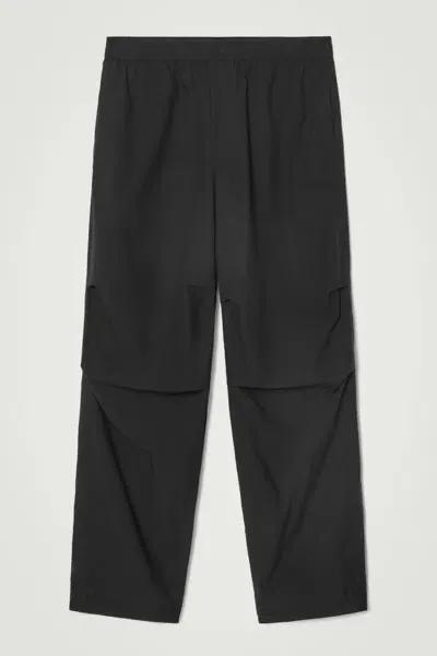 Cos Wide-leg Elasticated Cotton Trousers In Black