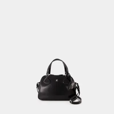 Courrèges Stud Spazzo Mini Bowling Purse In Black