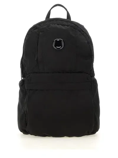 C.p. Company Lens Detailed Logo Patch Backpack In Black