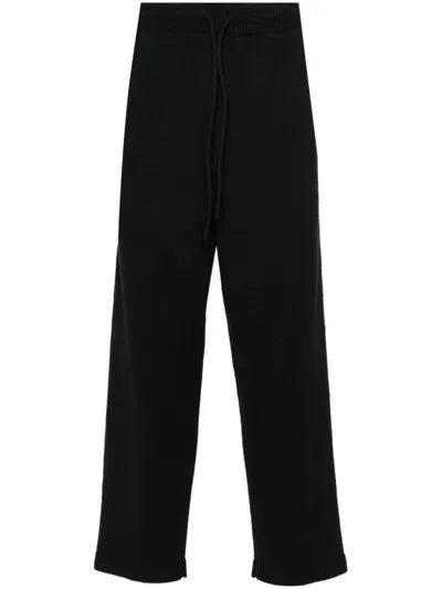 Craig Green Tapered-leg Trousers In Black