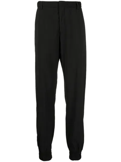 Emporio Armani Cuffed Virgin Wool Trousers In Schwarz