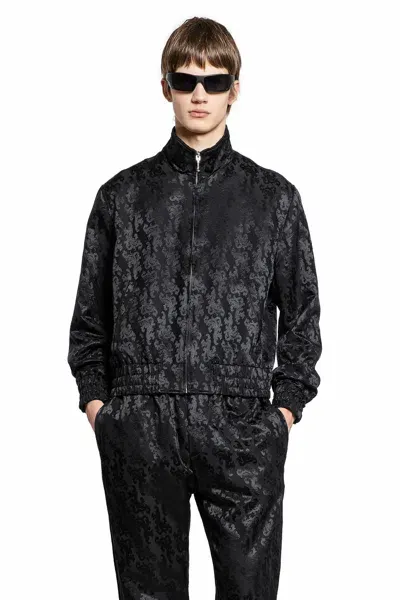 Ernest W Baker Man Black Jackets