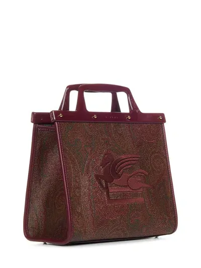 Etro Handbags. In Red