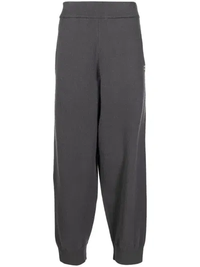 Extreme Cashmere Knit Track Trousers In Grau