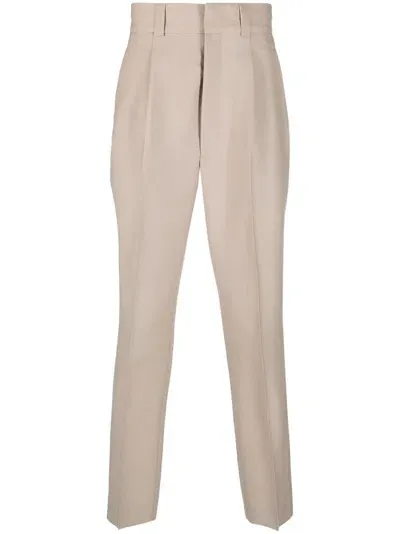 Fear Of God Pleated Tapered-leg Trousers In Neutrals