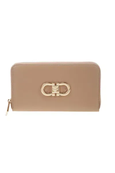 Ferragamo Gancini Zipped Wallet In Beige