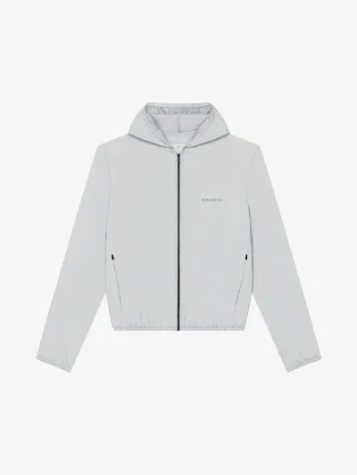 Givenchy Reflective Hooded Windreaker In Light Blue