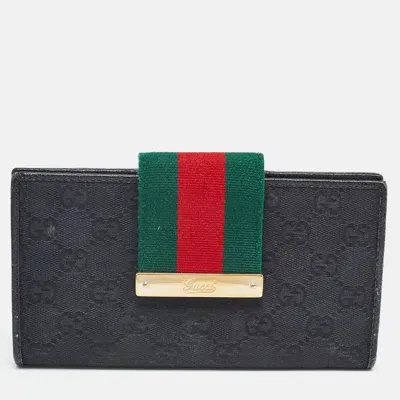 Pre-owned Gucci Black Gg Canvas And Leather Web Flap Wallet