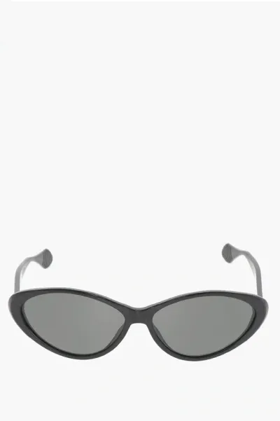 Gucci Solid Color Oval-frame Sunglasses In Black