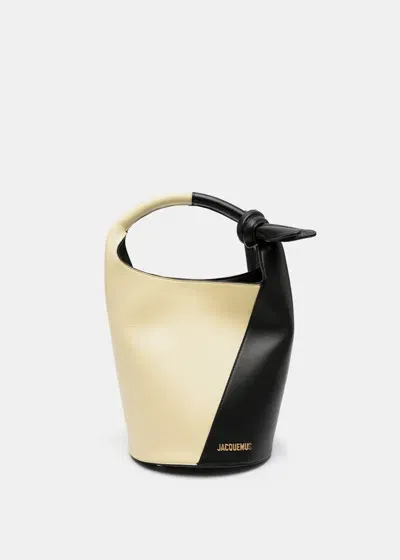 Jacquemus Le Petit Tourni Leather Bucket Bag In Pale Yellow/black