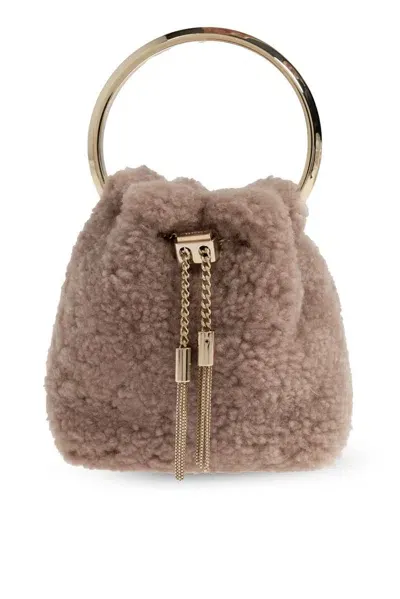 Jimmy Choo Logo Engraved Mini Bucket Bag In Brown