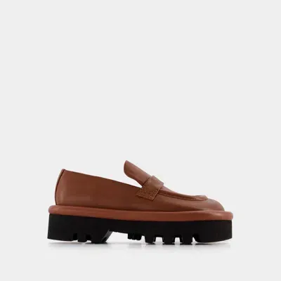 Jw Anderson J.w. Anderson Bumper Chunky Flats In Brown