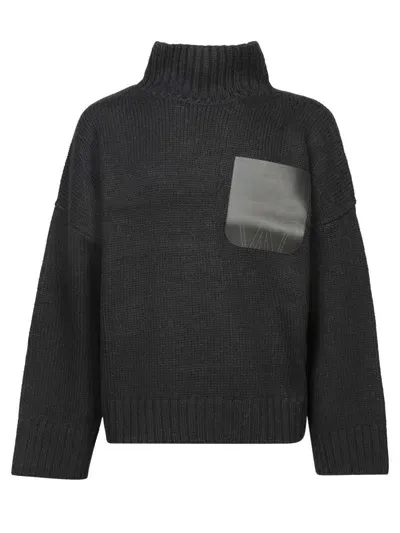 Jw Anderson Knitwear In Black