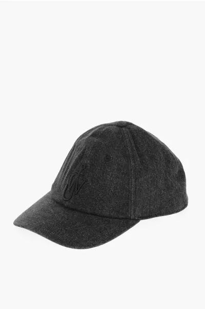 Jw Anderson Solid Color Denim Cap With Embossed Logo In Black