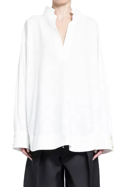 Khaite The Tito Curved Hem Top In White